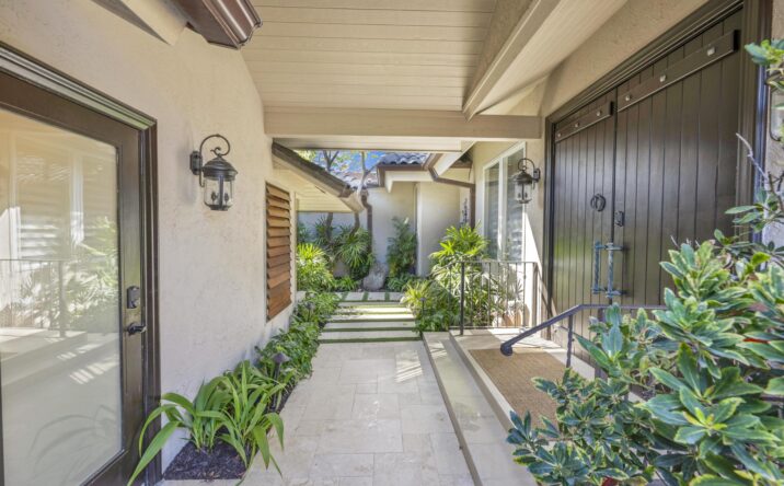 Covered residential walkway and garden entry by CKA Construction