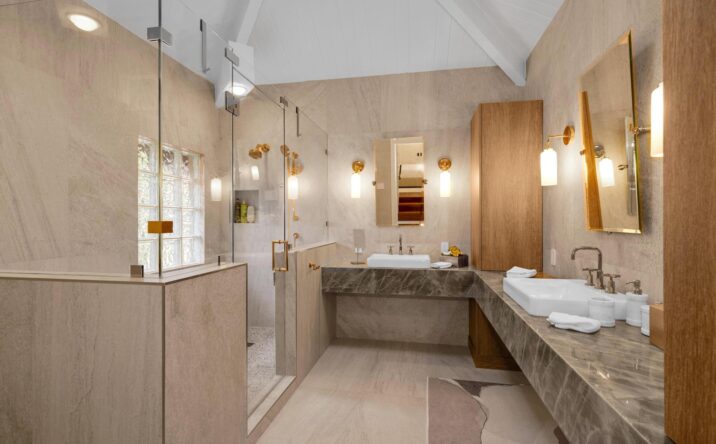 Luxury kitchen with custom cabinets and built-in appliances by CKA Construction