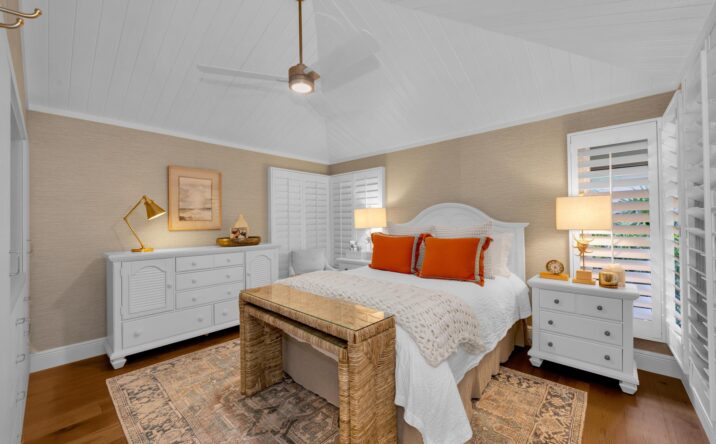 Primary bedroom with custom finishes by CKA Construction